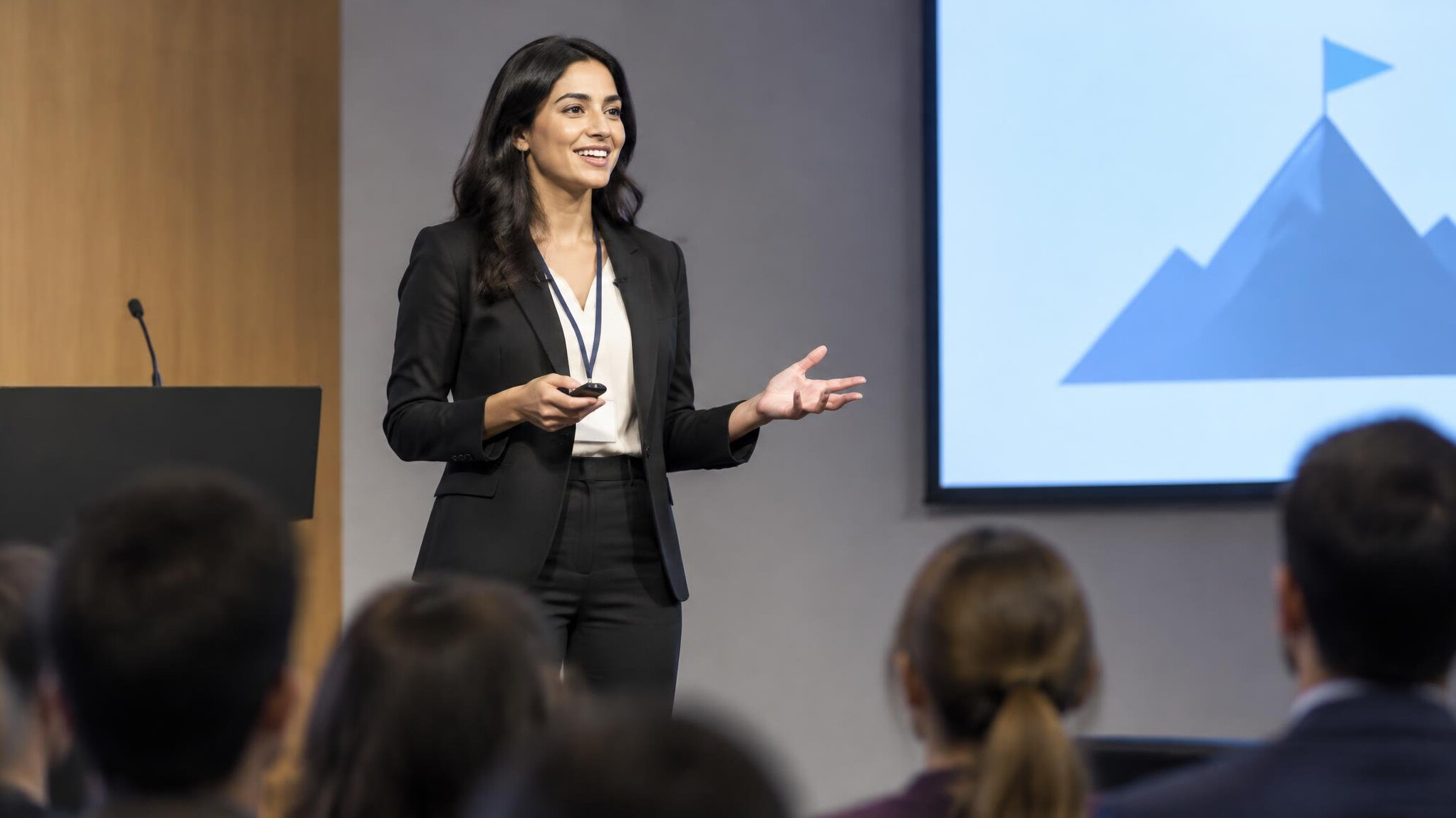 woman presenting to audience